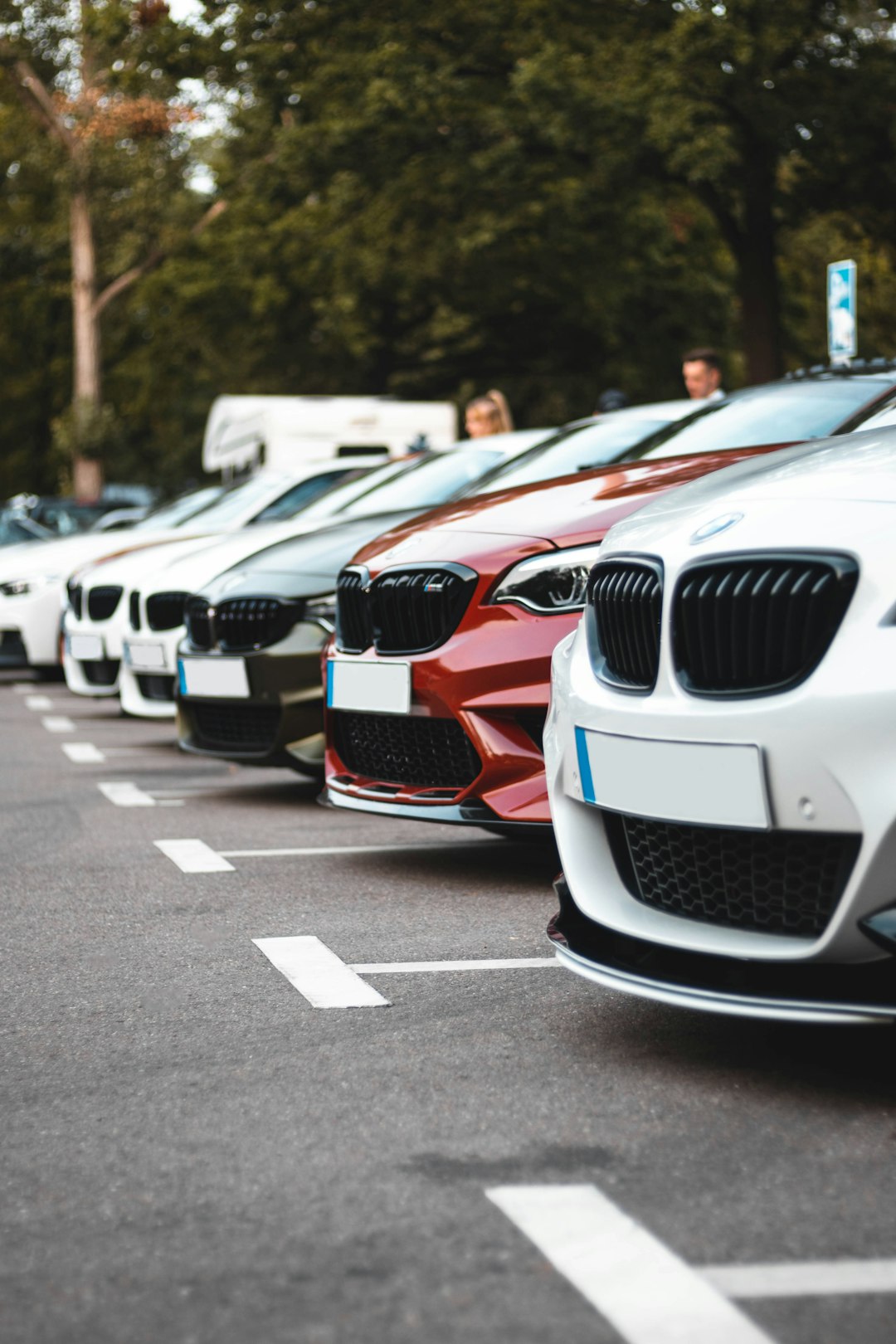 white-and-orange-bmw-m-3-on-road-during-daytime-mrdpwdw-qus